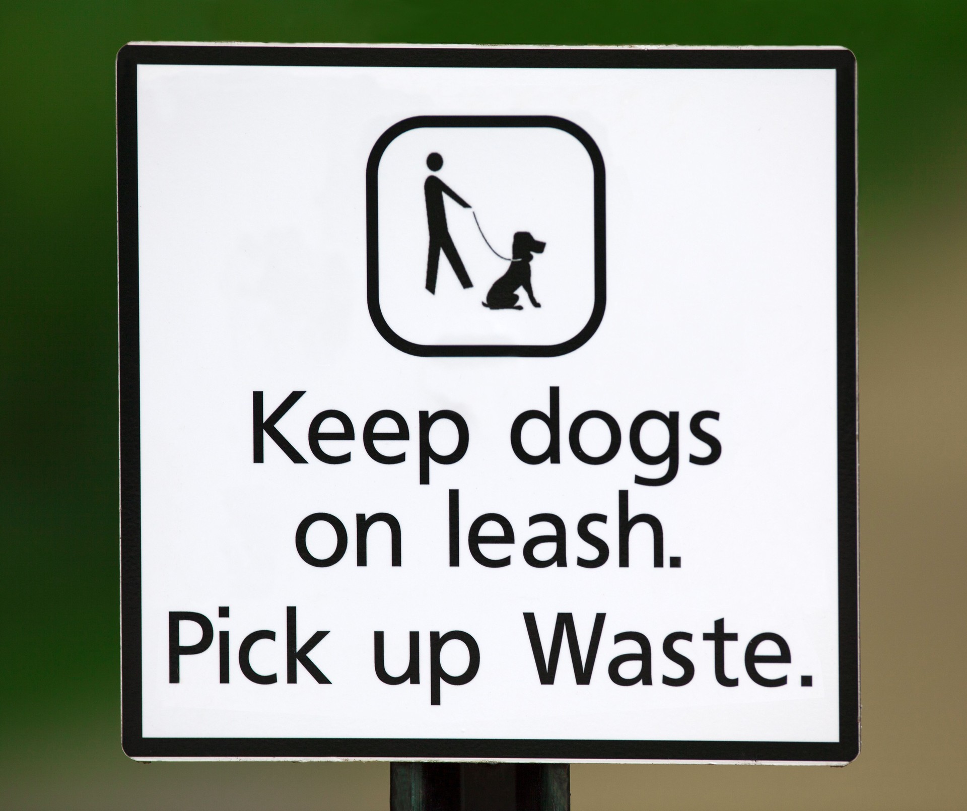Keep Dogs on Leash and Pick Up Pet Waste Sign